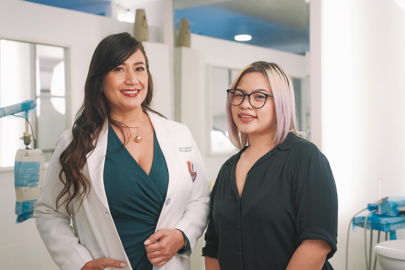 Dr Twinky and an international patient smiling together during a consultation
